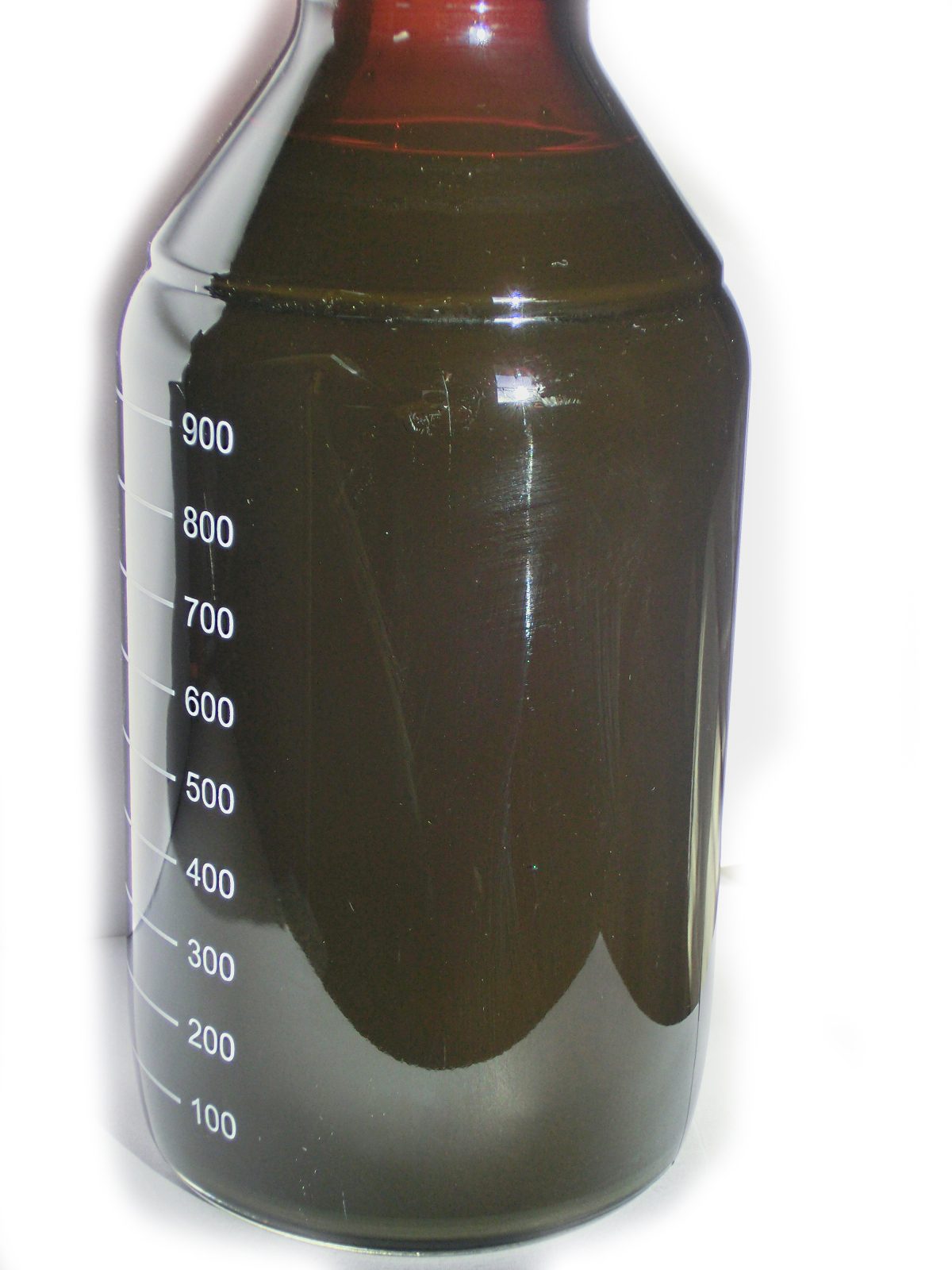A sample of dark crude oil