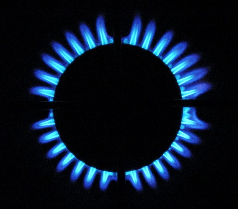 Blue flames on a gas stove