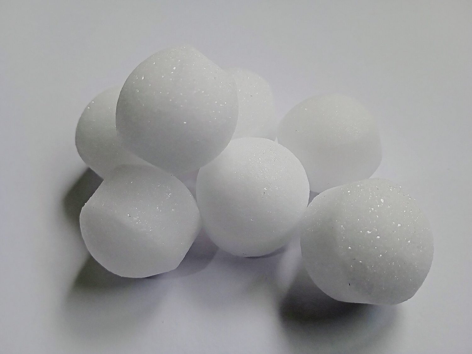 A pile of white mothballs