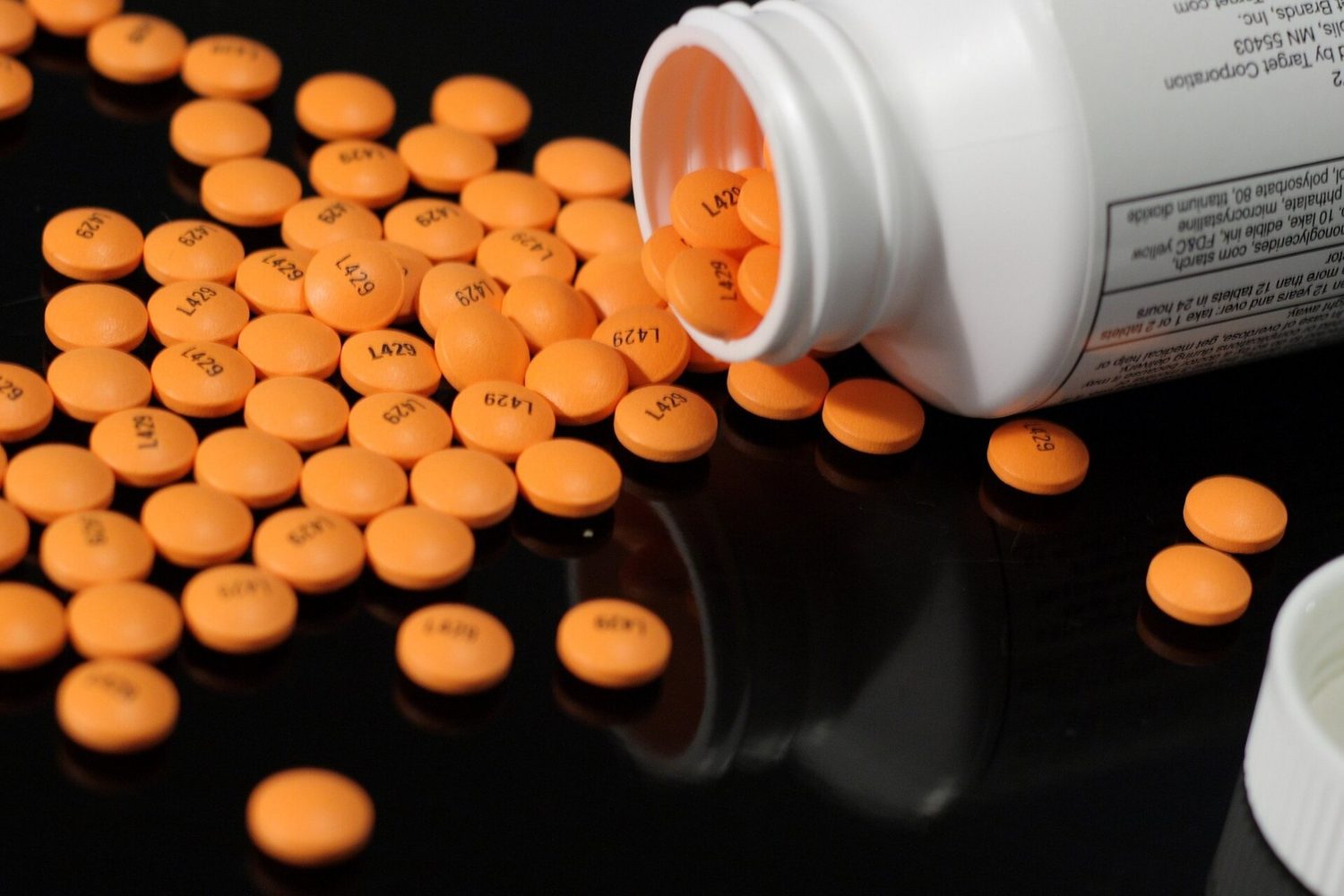 A bottle of aspirin tablets