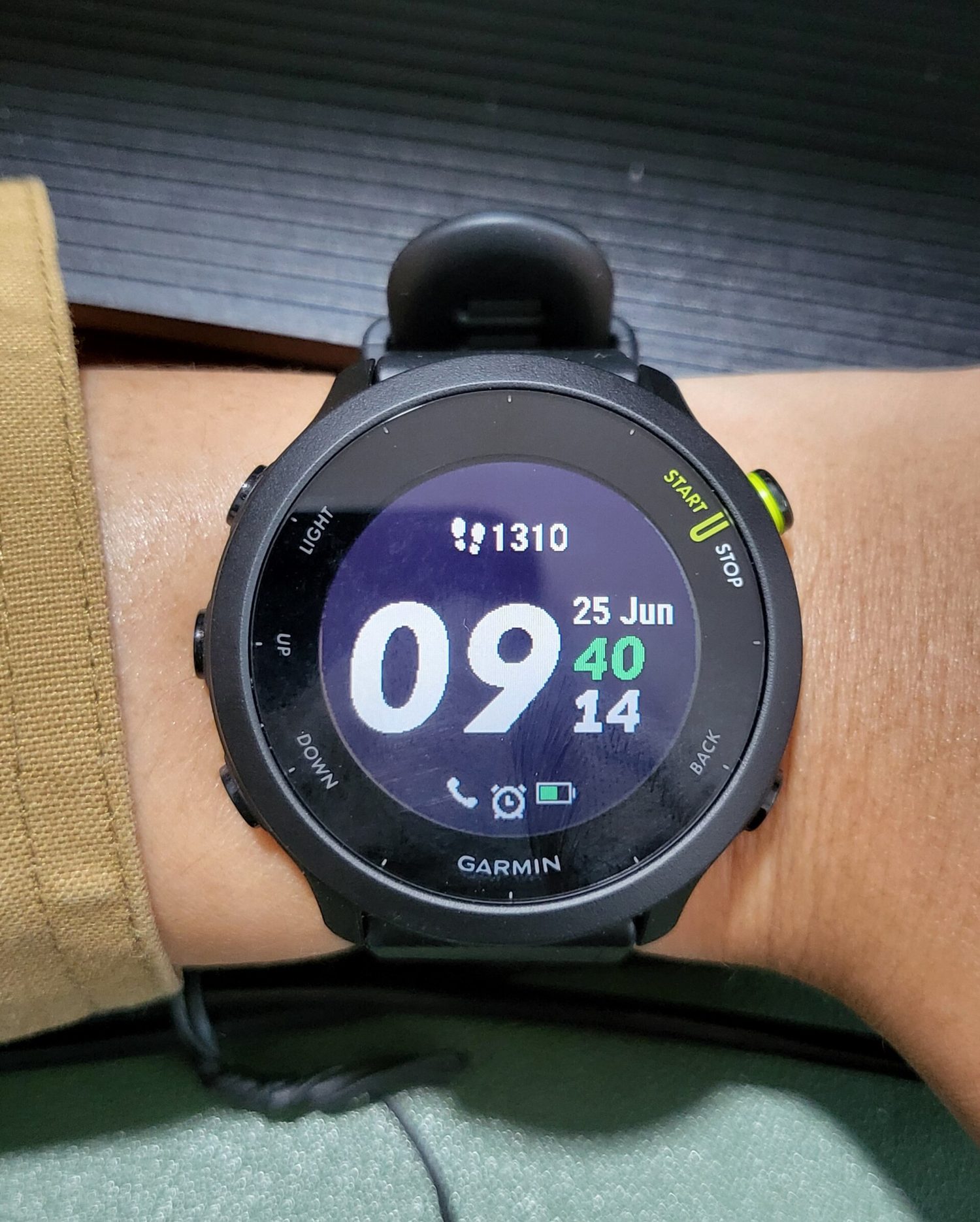 A heart-rate monitor worn on a runner's wrist