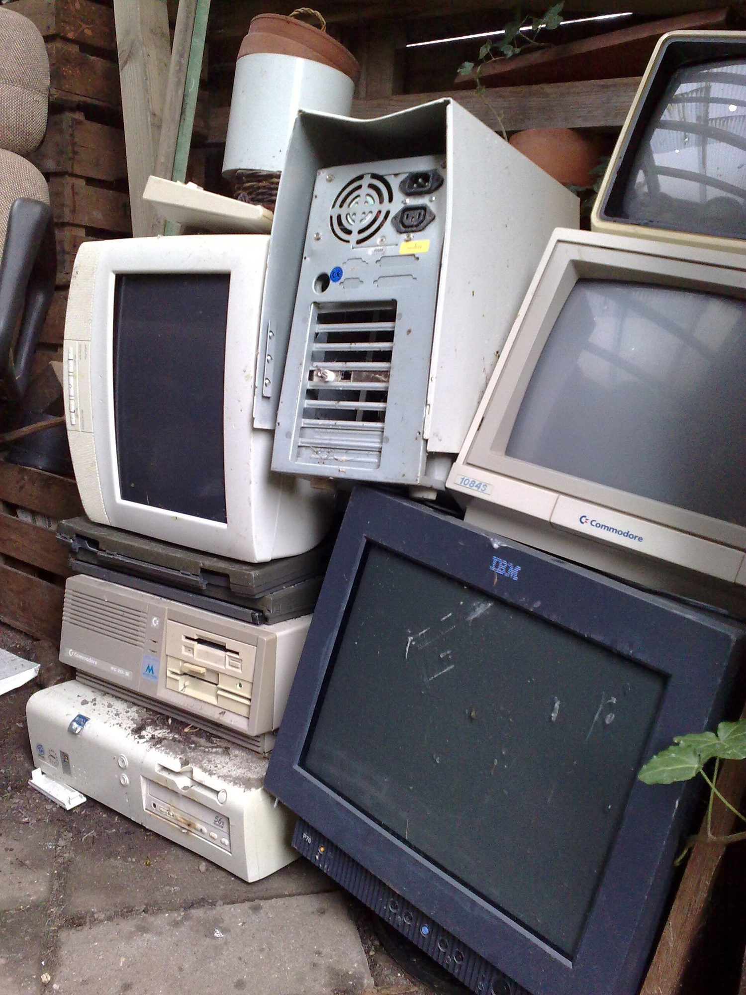 A pile of discarded electronic equipment