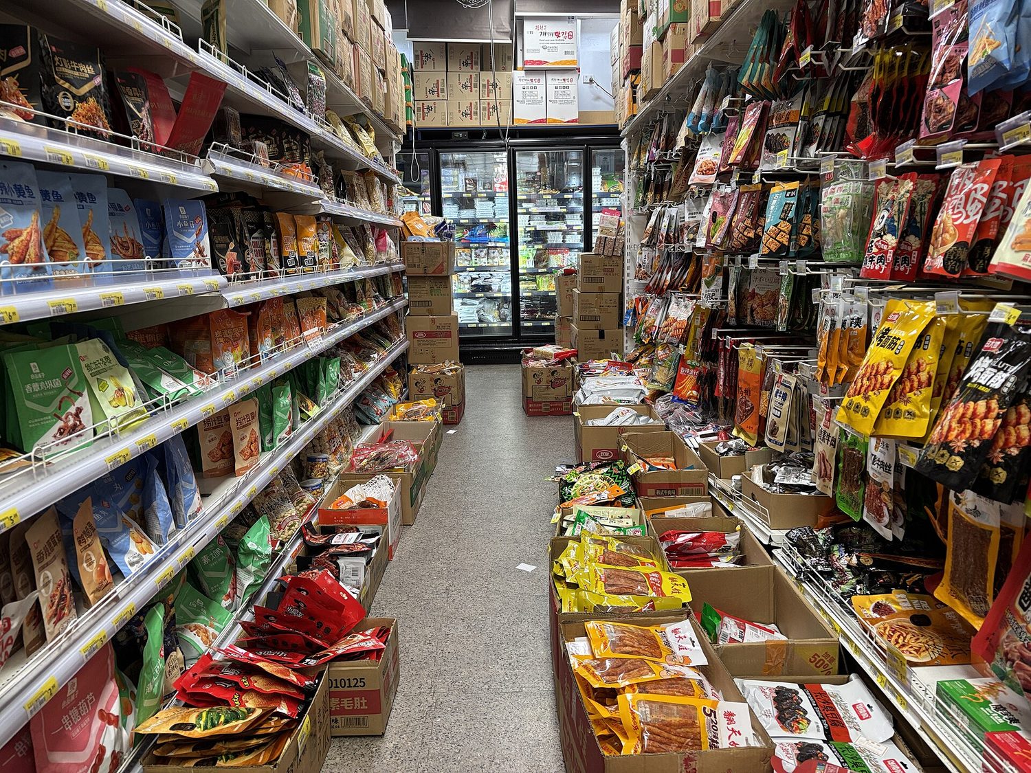 Supermarket shelves of groceries: inflation is measured from the price of a basket of everyday goods