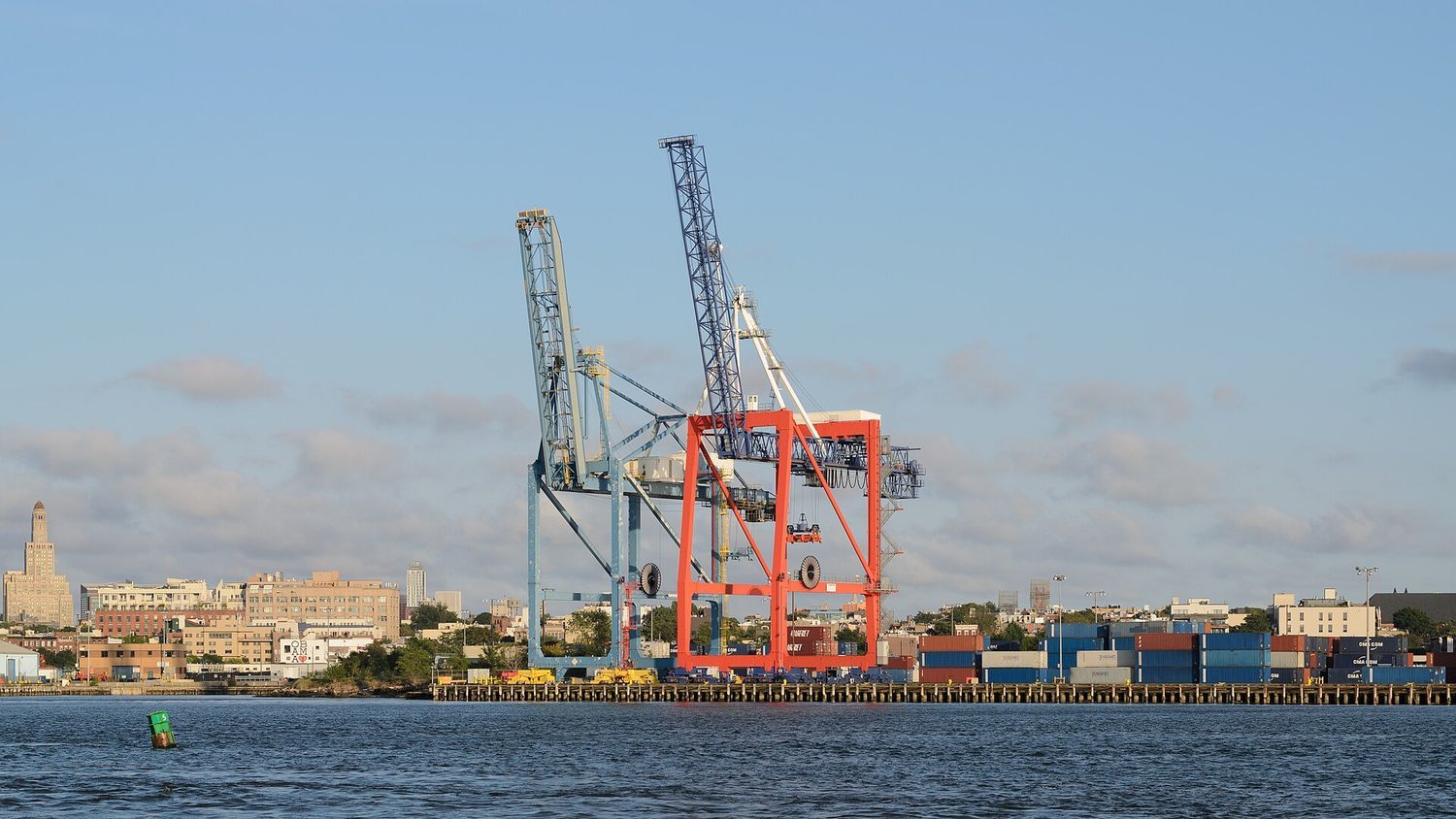 Trade flows at a container port: a current account deficit means imports of goods and services exceed exports