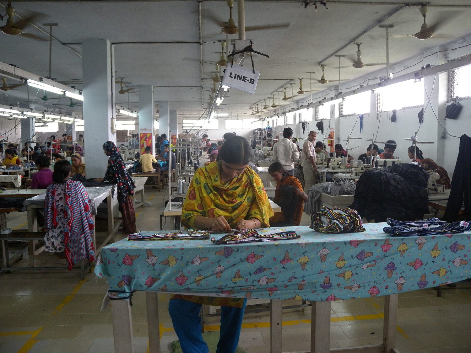 A garment factory: in a labour market, firms demand workers and the wage is the price of labour