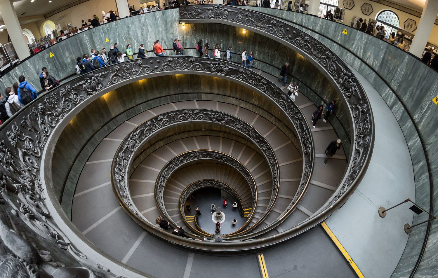 Looking down a grand spiral staircase