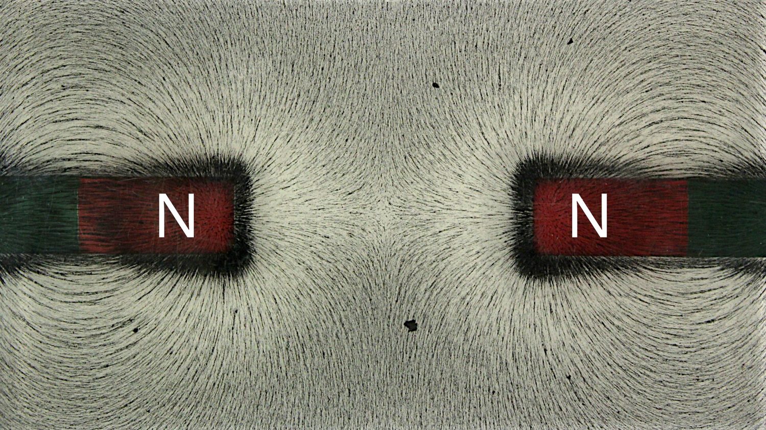Iron filings around bar magnets