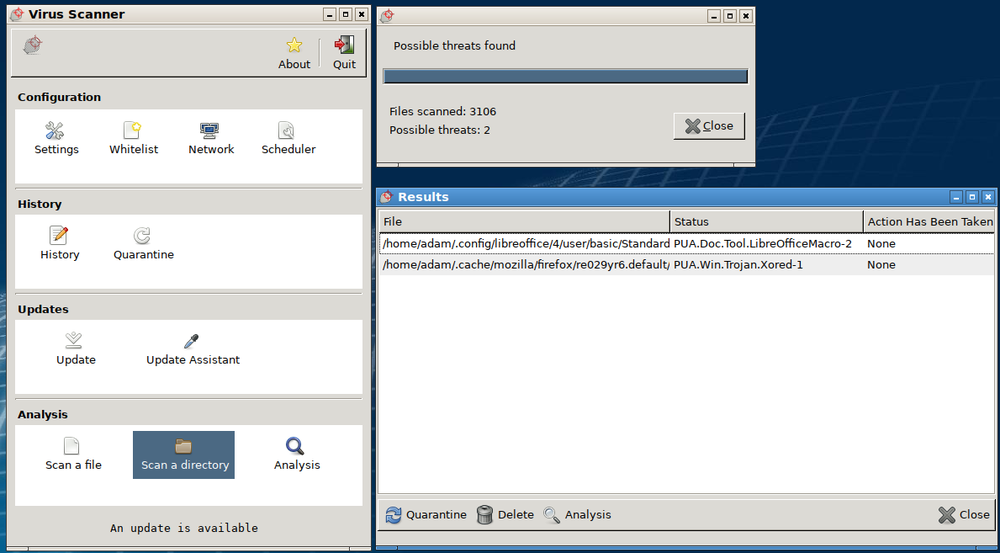An anti-malware scanner window: 3106 files scanned, two threats found, with quarantine and update controls