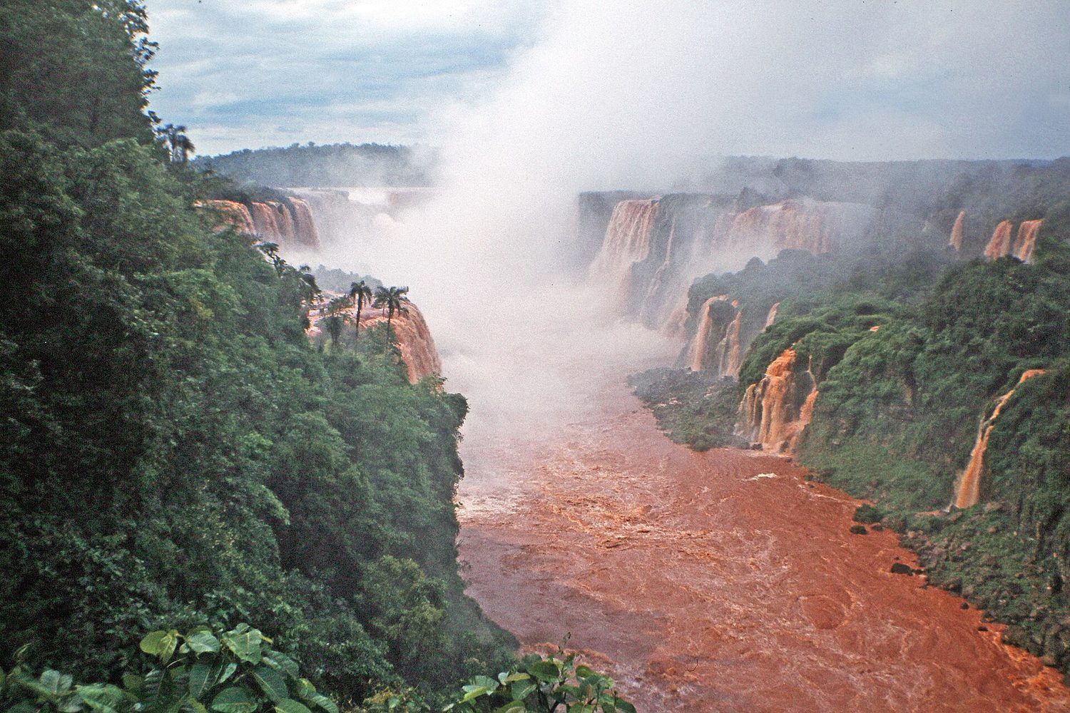 A waterfall in a river basin: a watershed is the land that drains into a stream or lake