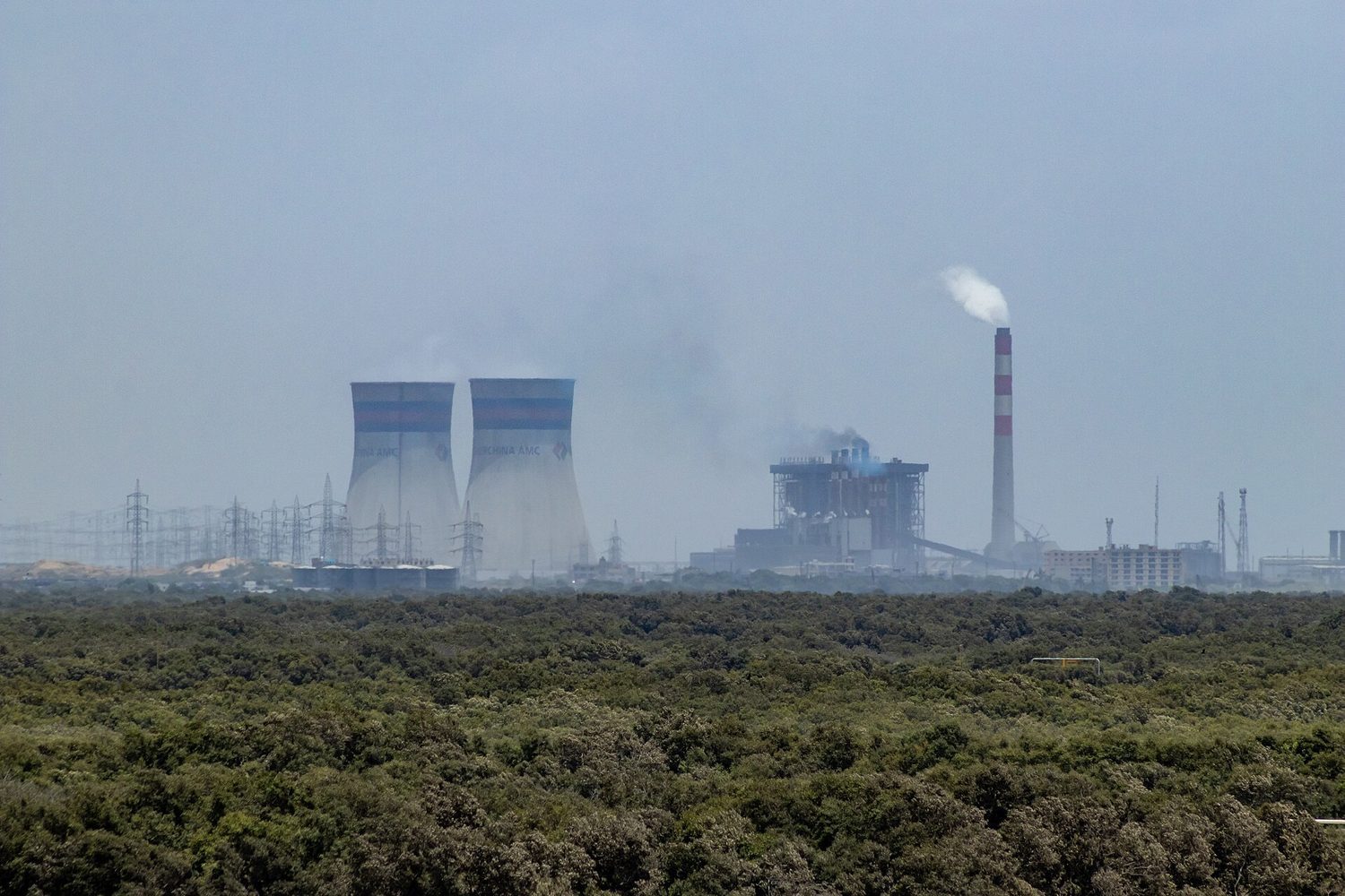 Industrial pollution: a negative externality where social cost exceeds private cost