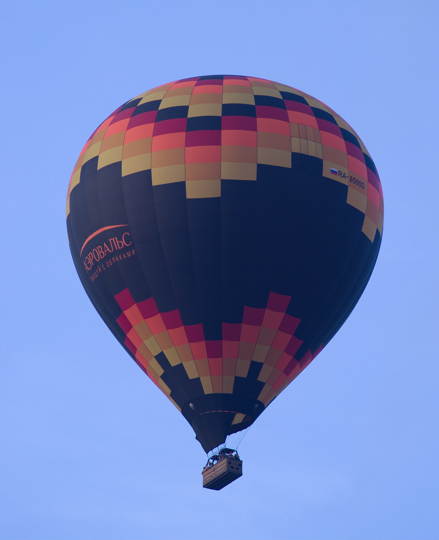 A hot air balloon rising into the sky