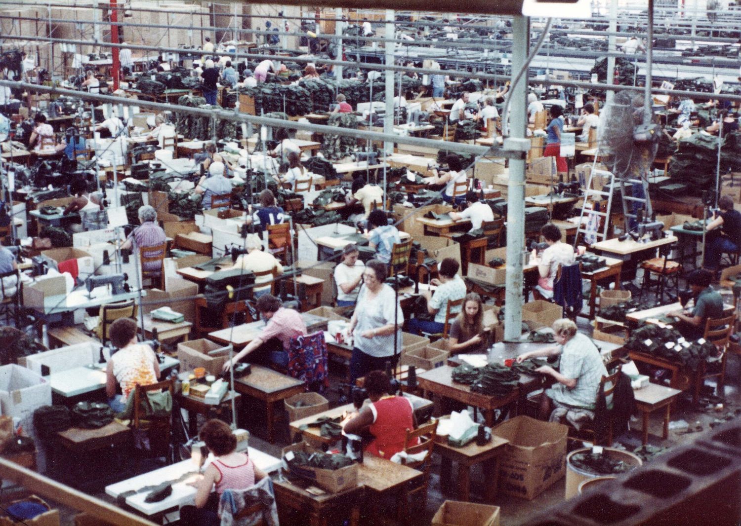 A workplace full of staff: a business must recruit, train and motivate its people