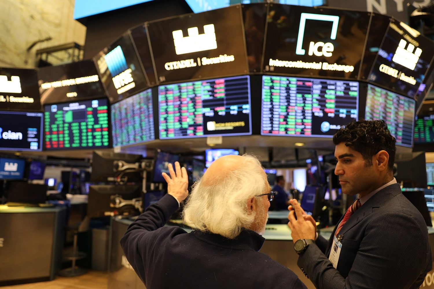 A stock exchange: public limited companies raise finance by selling shares