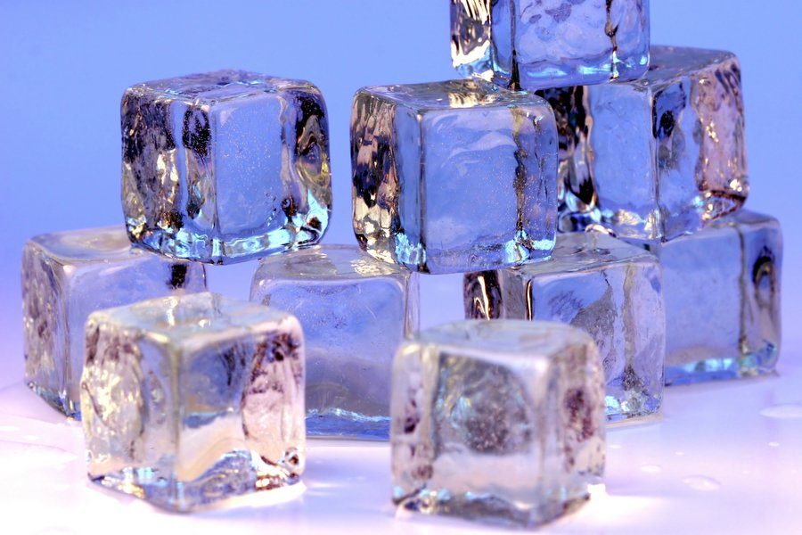 Ice cubes melting in a glass