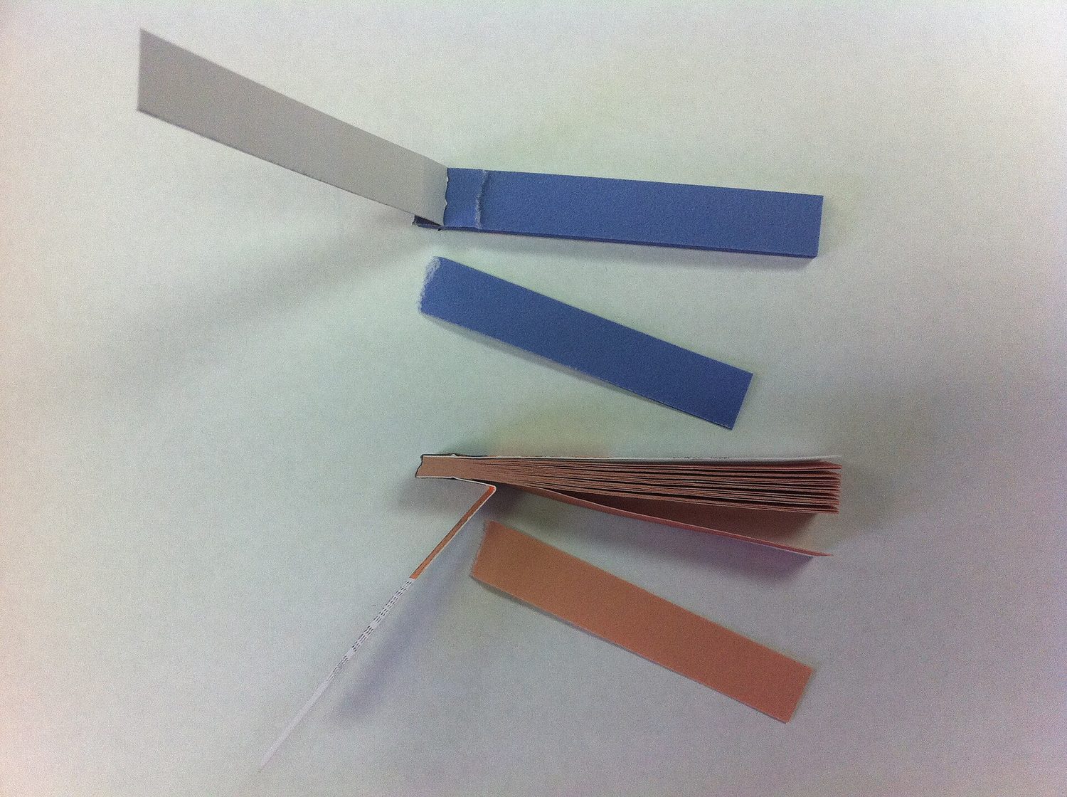 Litmus paper: blue turns red in acid, red turns blue in alkali