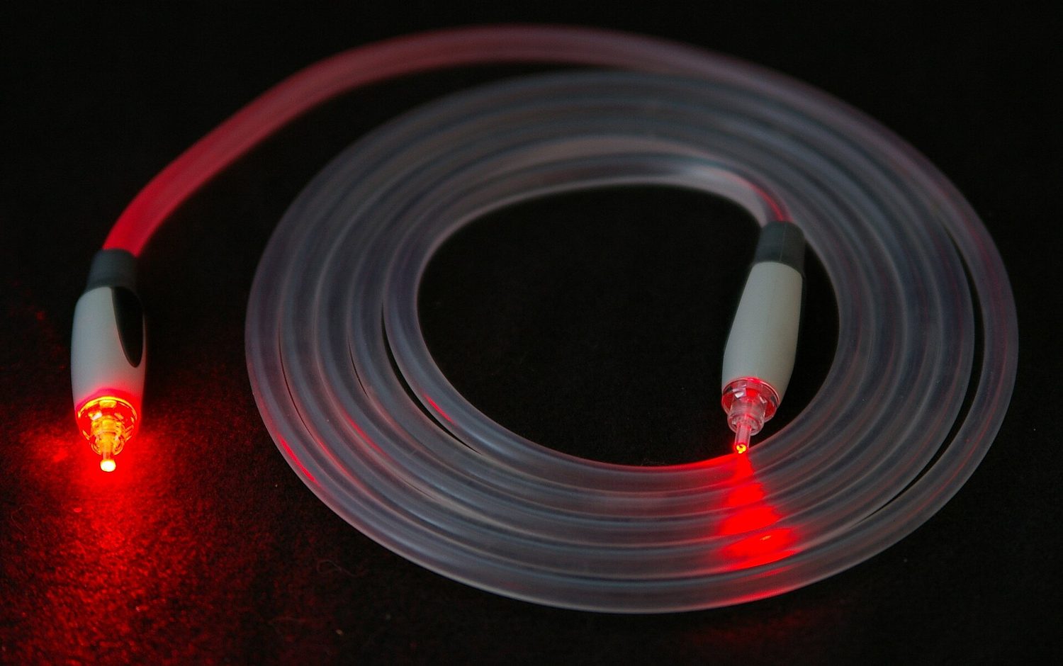 A fibre-optic cable carries data as pulses of light along thin glass fibres