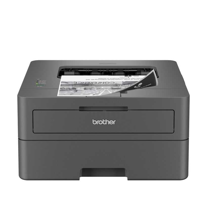 A white-and-grey desktop laser printer with its paper trays folded out