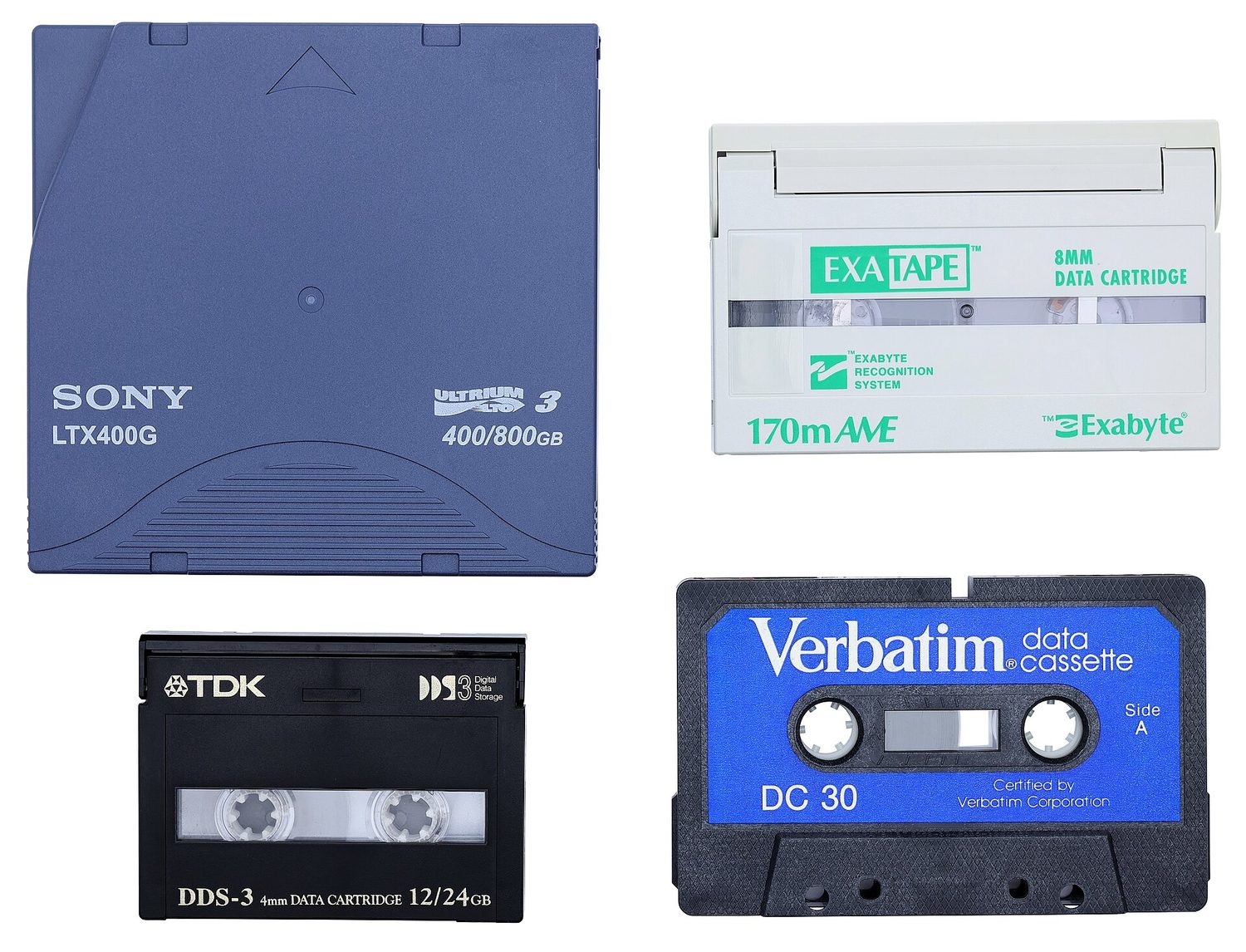 Four square magnetic-tape cartridges, each holding a reel of thin magnetic tape