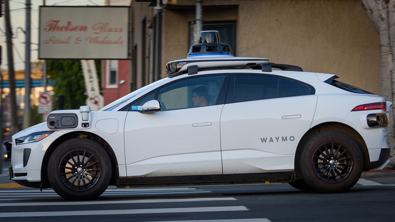 A self-driving car: sensors on the car let a computer steer it with no driver