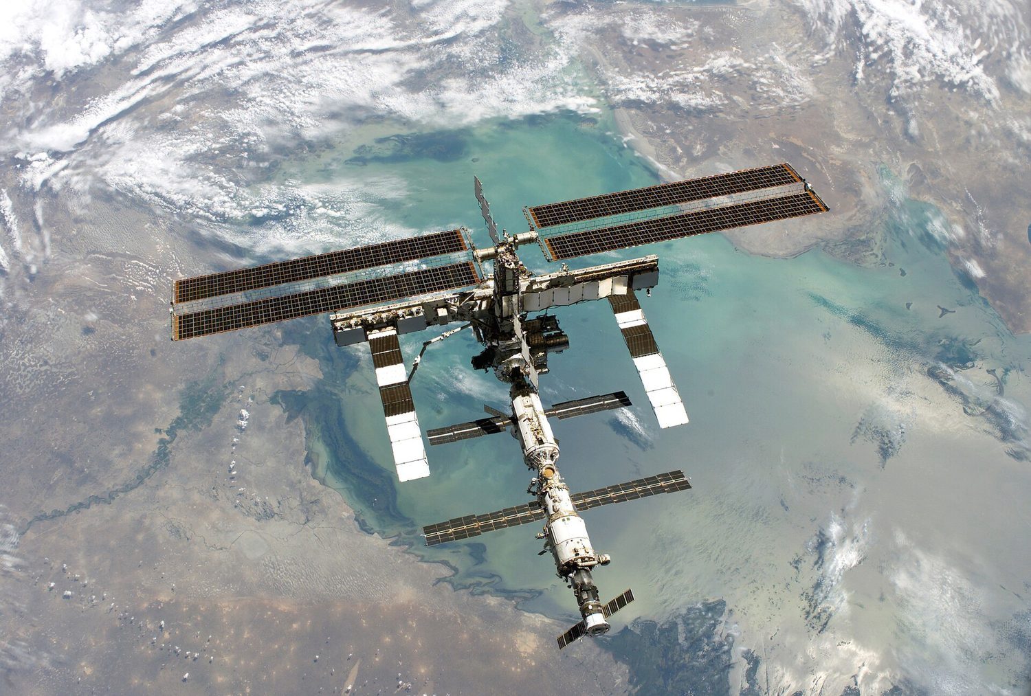 The ISS in orbit: orbital speed is the speed that keeps a satellite in free-fall circular motion