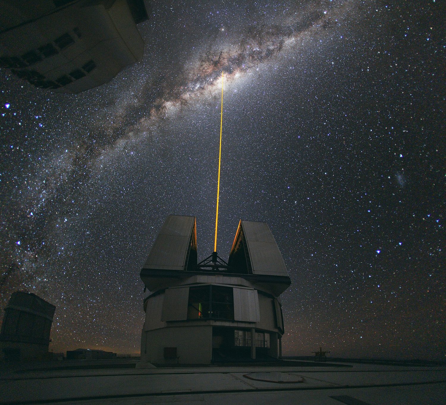 A giant telescope fires a laser to study the night sky